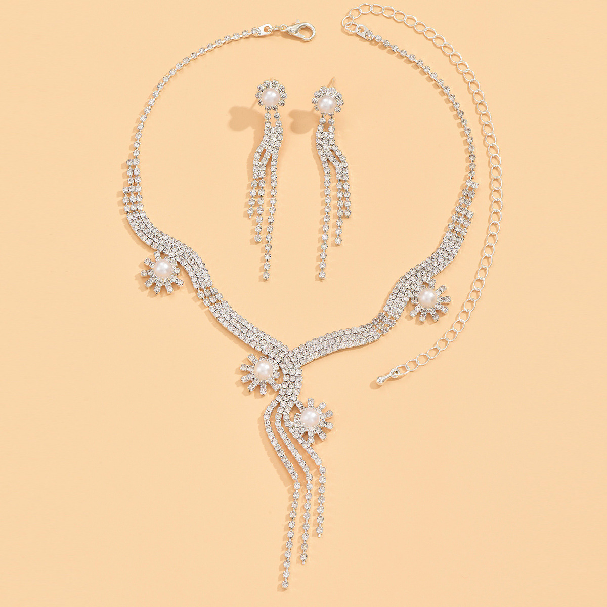 Joyería popular europea y americana de alta gama de La Boda nupcial del Partido de las mujeres de imitación perla agua diamante borla collar espárragos conjunto