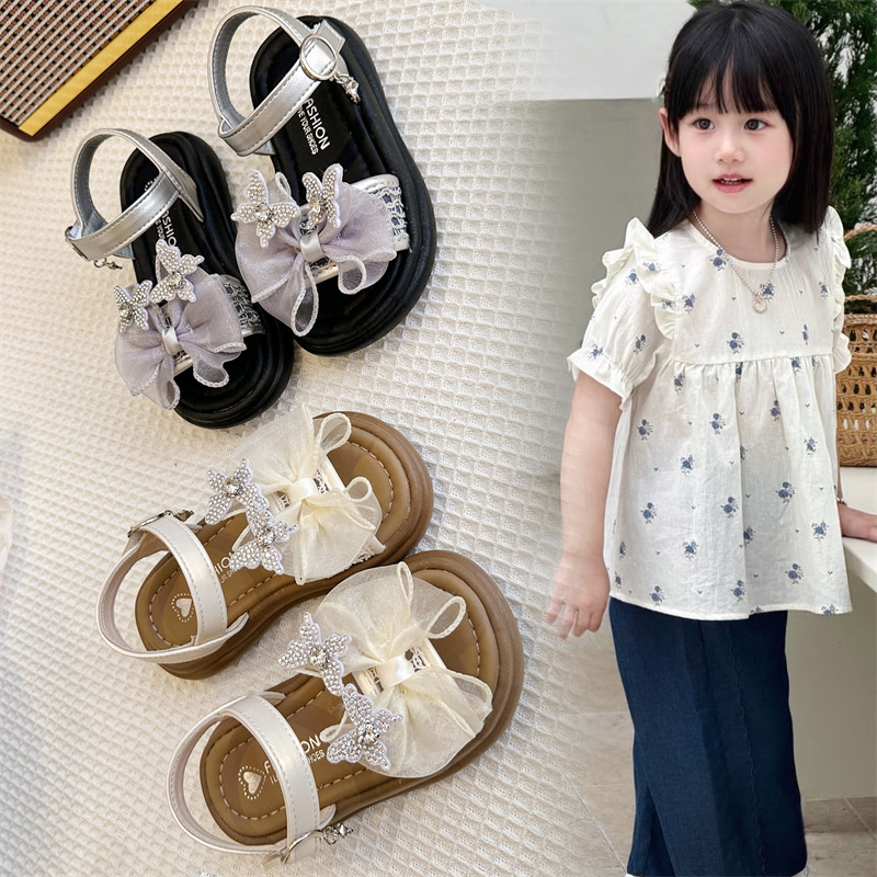 Zapatos de princesa de arco para niños verano 2026 nuevo estilo de moda para niñas zapatos de playa versátiles zapatos de mariposa para niños zapatos Lefour