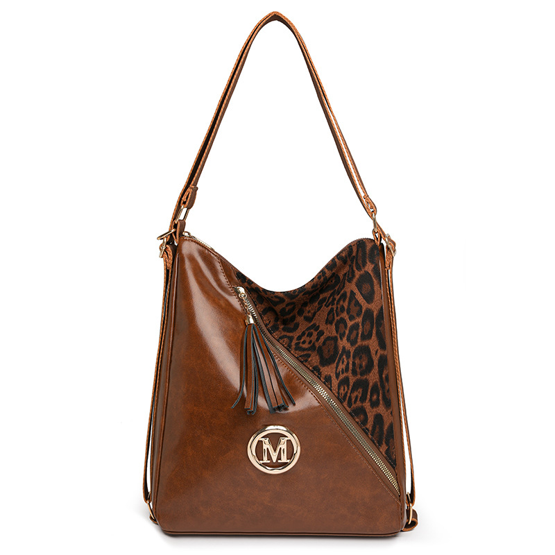 Lujo ligero, nicho, textura de alta calidad, bolso de alta capacidad, moda femenina, estampado de leopardo, bolso de hombro multifuncional al por mayor