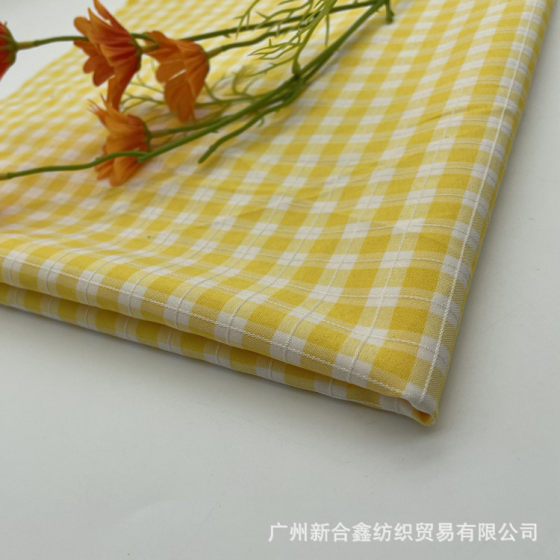 JK college style pleated skirt fabric spring and summer popular Plaid in stock supply yarn-dyed plaid full polyester Plaid