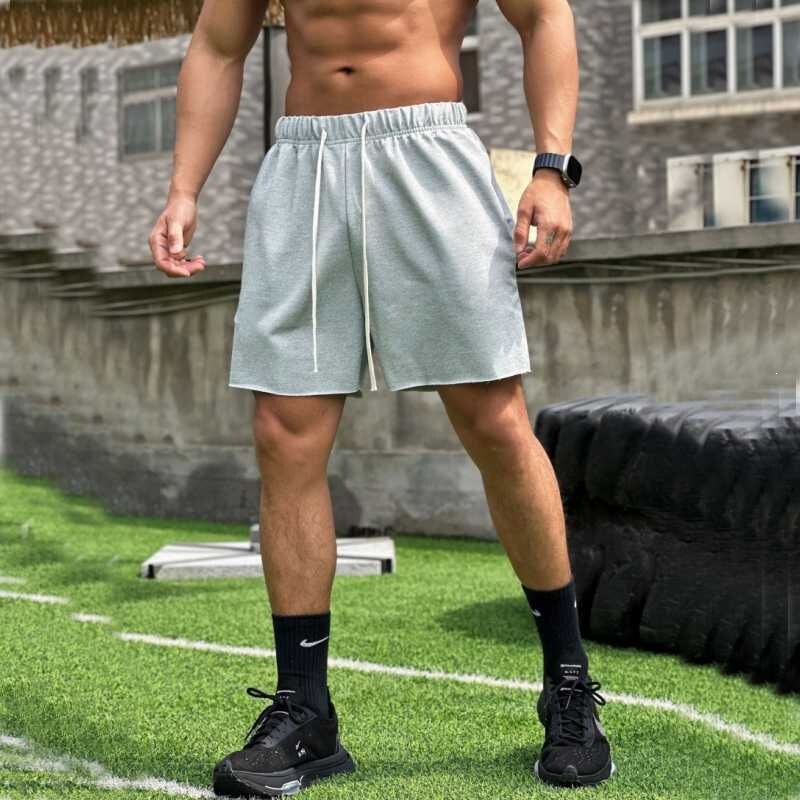 American-Style Men's Loose-Fitting Gray Cotton Shorts with Rolled Edges, Above the Knee, for Sports, Running, Training, and Casual Basketball
