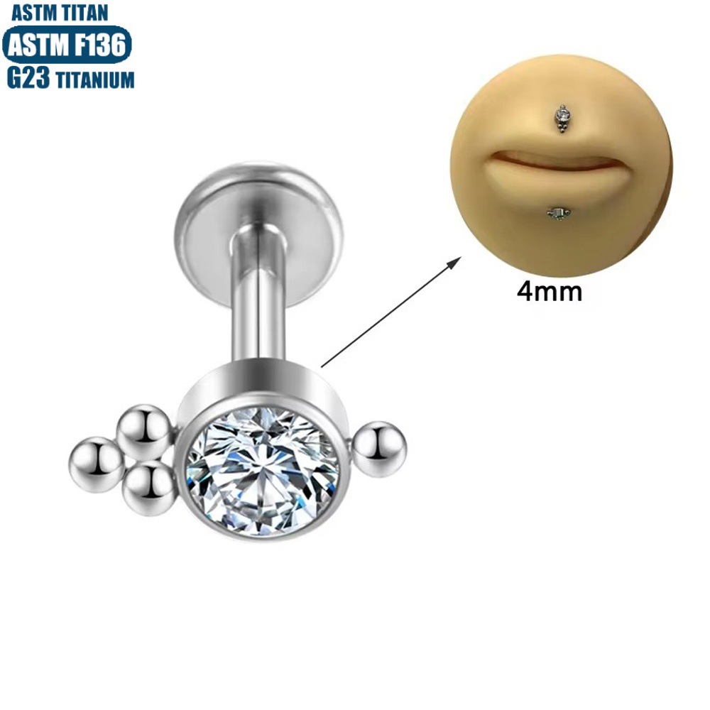 Silver pointed spike labret stud material detail