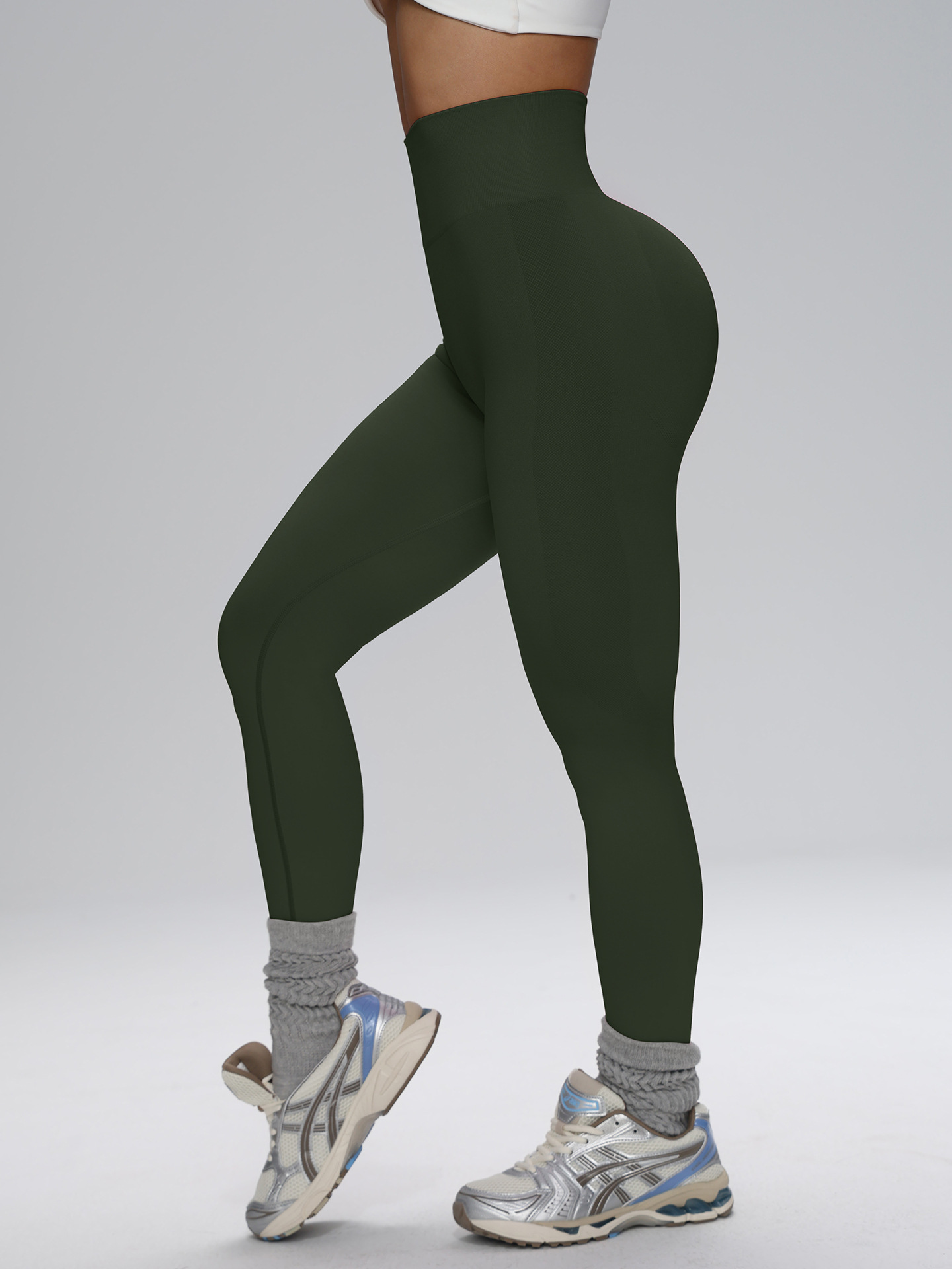Europa y los Estados Unidos sin costuras cintura alta pantalon de gimnasio de alta cadera para mujeres corriendo al aire libre apertado nueve pantalones de pelusa de miel