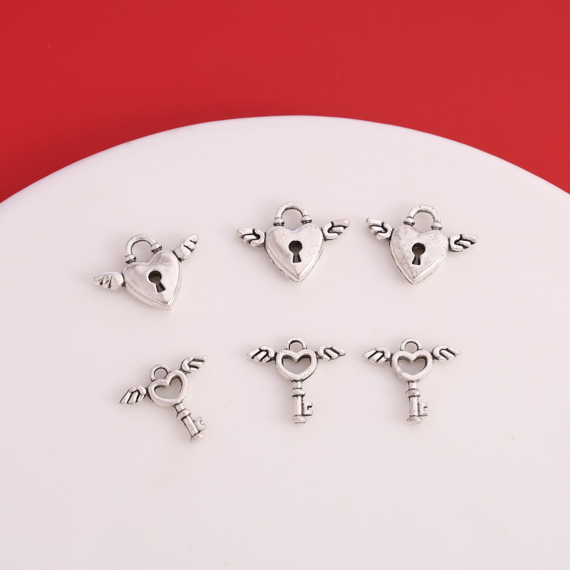 Cross-Border Hot Selling Angel Wings Key Lock Couple Pendant DIY Bracelet Necklace Earrings Pendant Alloy Accessories Cross-Border Hot Selling Angel Wings Key Lock Couple Pendant DIY Bracelet Necklace Earrings Pendant Alloy Accessories