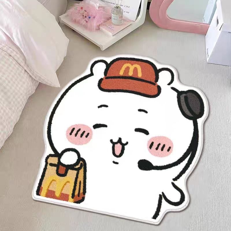 맥키이가 작은 눈을 가늘게 뜨고 있다