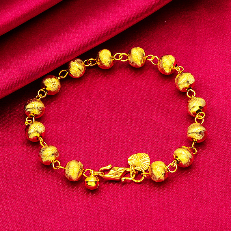 Pulsera unisex de moda con diseño de ojo de gato en oro y arena_voghion.com