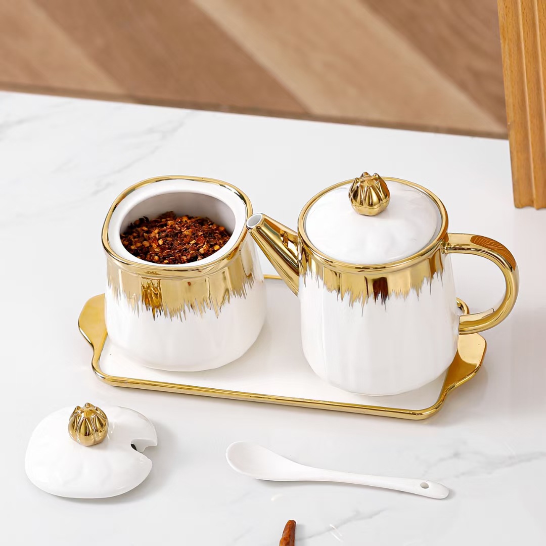 Botella de condimento de cerámica de lujo ligera y creativa botella de condimento de cocina con regalo de mano galvanizado estilo nórdico caja de sal y vinagre personalizada