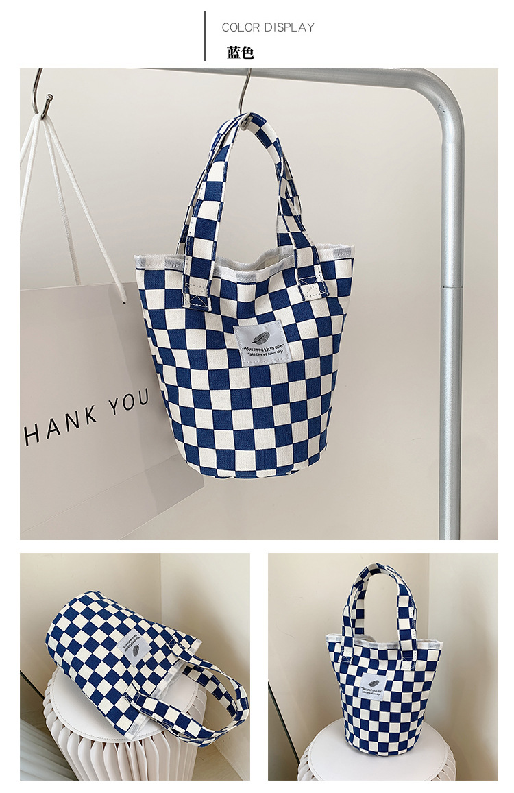 A fashionable new Japanese and Korean chic black and white checkered canvas bag, a large-capacity single-shoulder bag for women, and a simple student handbag undefined