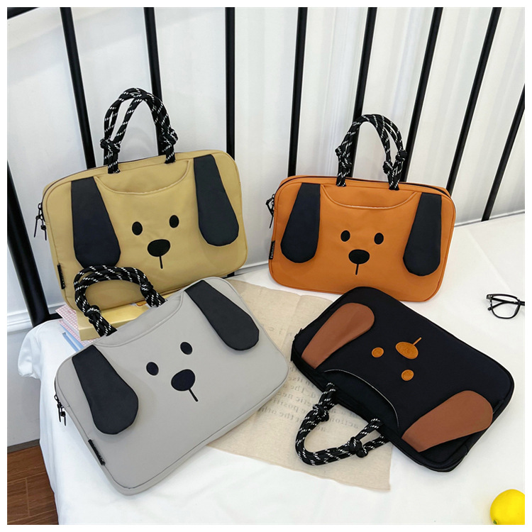 Portable, fleece-lined, shockproof laptop bag with a cartoon design, featuring colorful painted leather and a waterproof storage compartment