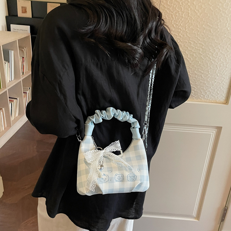 Bolso coreano nicho pliegueado, moda femenina, bolso de hombro, sensación cotidiana, bolso de media luna de nubes de viaje