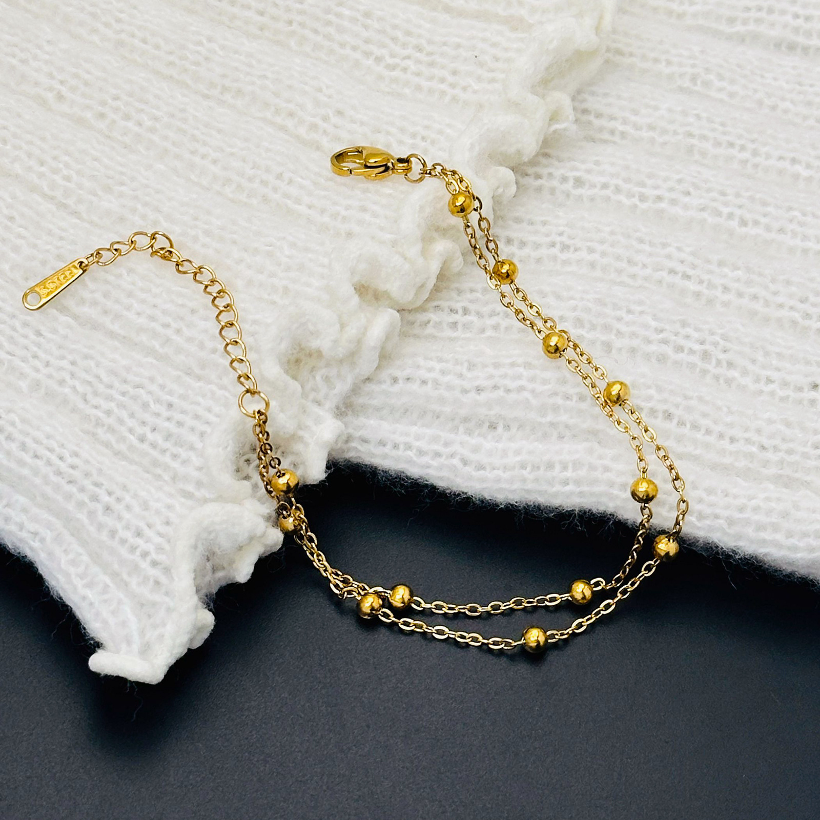 Pulsera de cuentas simple de doble capa que no se desvanece, oro nuevo diseño de nicho ins, niña, novia, joyería de mano femenina