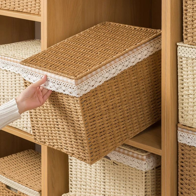 収納かごは草編みのデスクトップの間食収納かごの家庭用編みをまねて、籐編みのおもちゃ収納ケースを制定することができます。