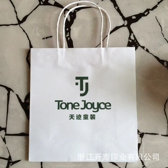 生产可按您的要求生产黄牛皮绳彩色印刷手提袋纸袋定 制