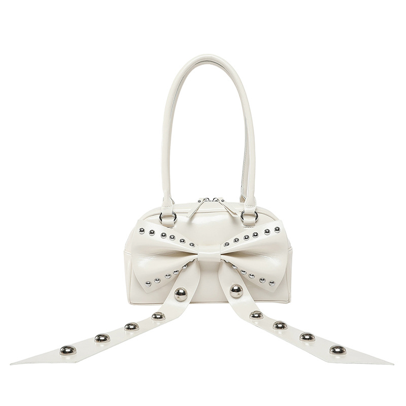 Bolso de axila de textura de alta calidad 2025 verano nuevo bolso femenino lindo lazo bolso de hombro con remache personalizado