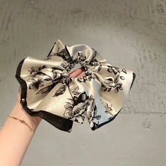 韓国輸入のサテンのプリントの肥腸圏の気質の新しい中国式の高級感のしわのシュシュは団子の頭の輪のひもを刺します。