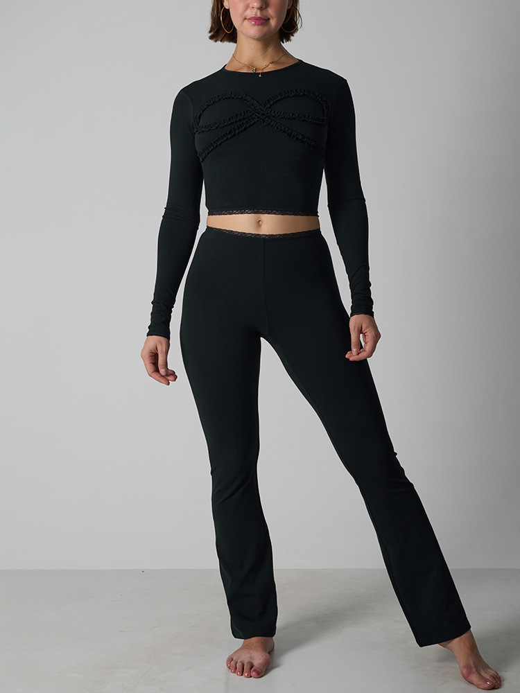 Dames set met high waist flare legging en cropped top_voghion.com