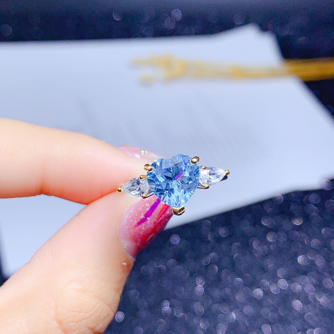 New Imitating Natural Heart-shaped Sky Blue Topaz Color Treasure Opening Ring display picture 7