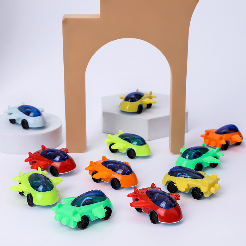 Deslizamiento de dibujos animados mini avión Juguete huevo juguete suerte dibujar pequeño juguete al por mayor WeChat empuje pequeño regalo