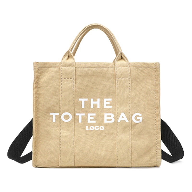 Bolsas de mano 2022 nuevo diseño de nicho personalizado creativo bolsa de lona de las mujeres del todo-fósforo de gran capacidad portátil crossbody