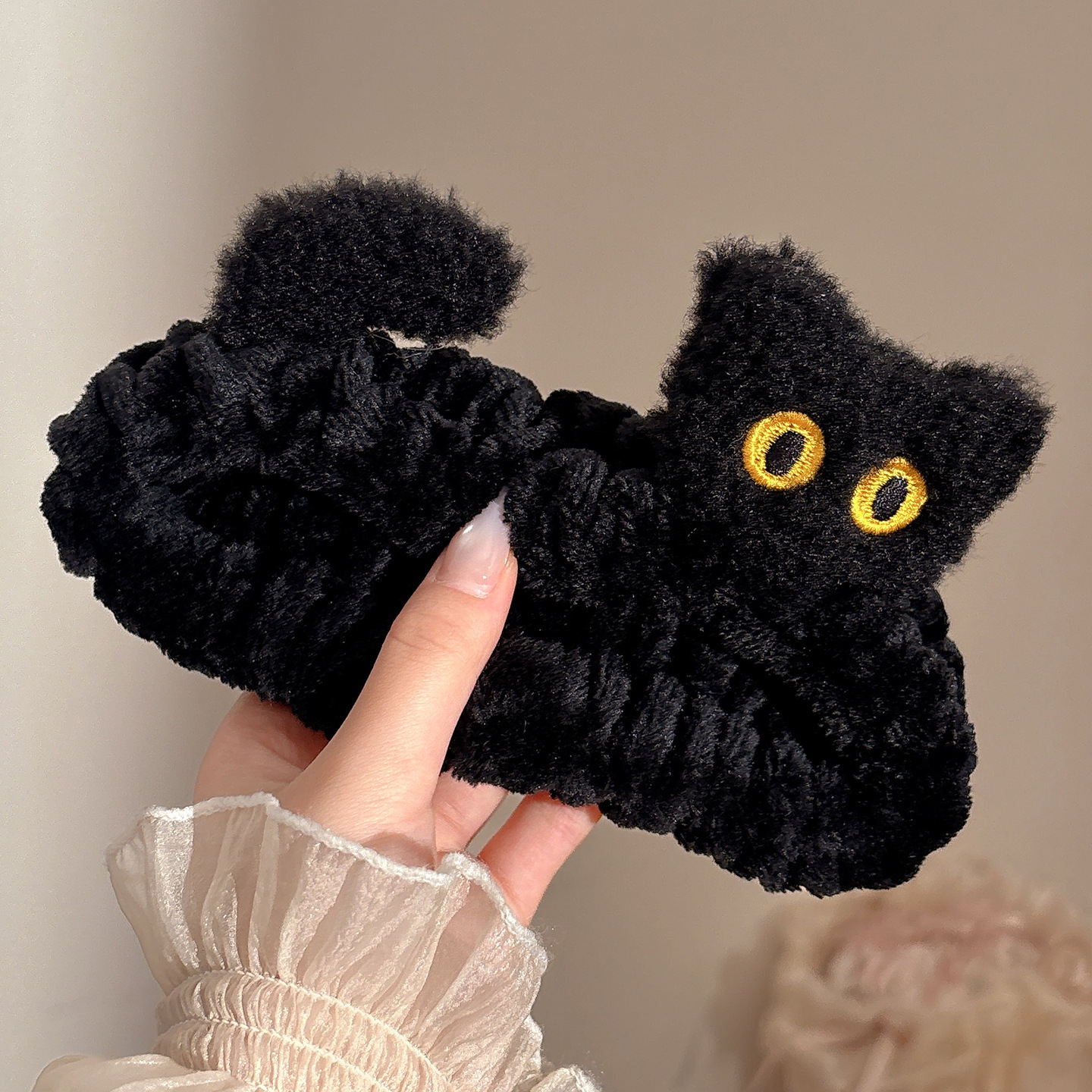 4 gatito negro (unos 19 cm)