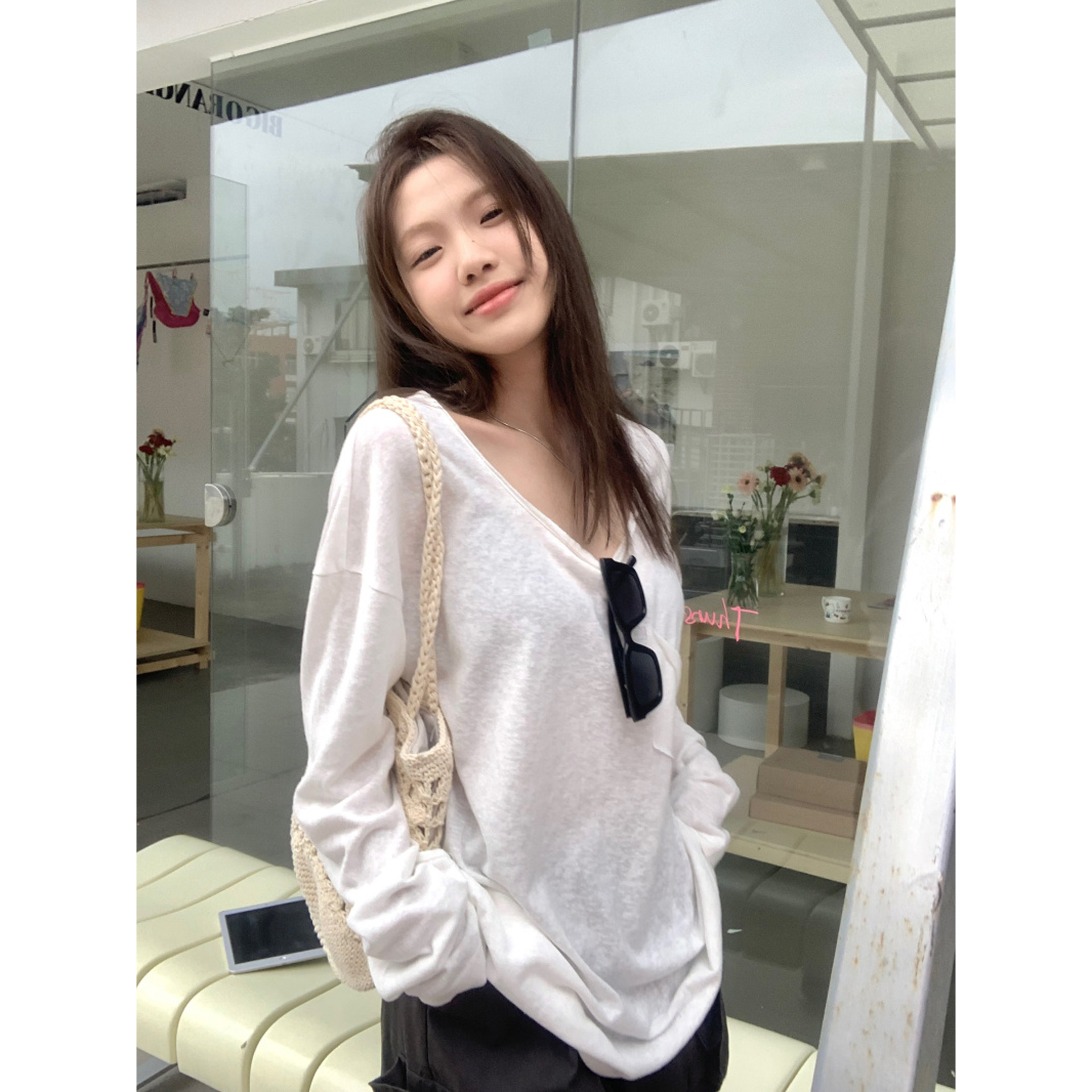 白い薄い長袖の日焼け止めブラウスtシャツの女性の夏の新型の怠惰な風がゆったりしていて、やせています。