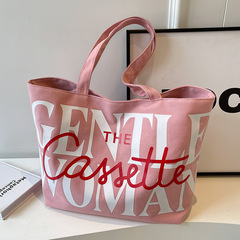 タイのニッチな女性用キャンバスバッグ 2024 大容量ハンドバッグ レタープリント シングルショルダー クラス トートバッグ レタープリント