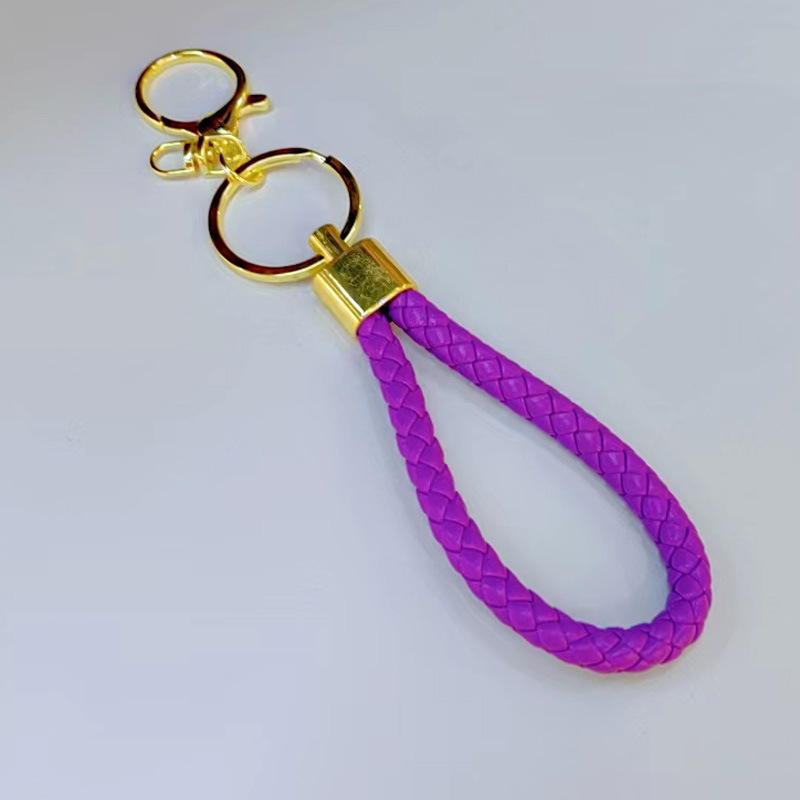 Ronda de la langosta hebilla PU cuero trenzado cuerda llavero hombres y mujeres amor llavero mano cuerda bolsa cordón fábrica directa al por mayor