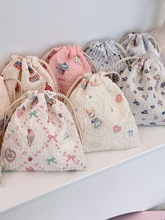 48151【版权款】卡通抽绳束口袋学生收纳袋口红化妆包便携三件套