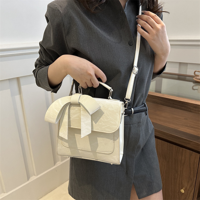 Mochila de hombro de arco para mujeres 2024 nueva moda estilo académico mochila de estilo universal bolso de mano bolso de viaje