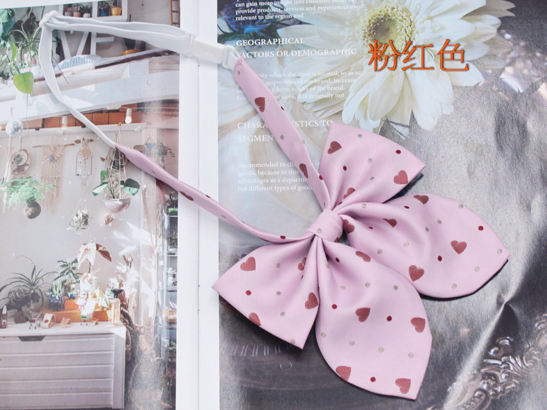 Spot al por mayor amor corbata de pajarita de oreja de conejo mujer jacquard de seda de poliéster más estilo universitario duro pajarita de pajarita flor de diez colores