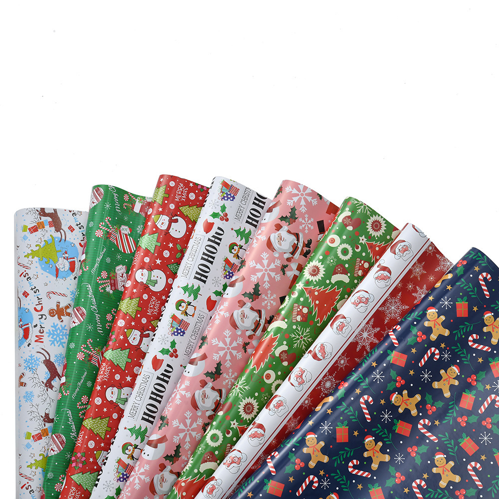 Nuevo papel brillante de bronce transfronterizo papel de embalaje de regalo de Navidad Papá Noel dibujos animados árbol de Navidad diy papel de regalo