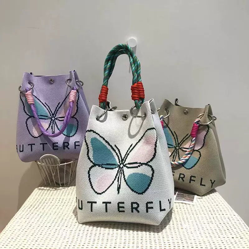 Nueva edición de la pequeña bolsa de mano de nudo de corda de viento de primavera y otoño elegante para viajar bolsa de mano de gran capacidad