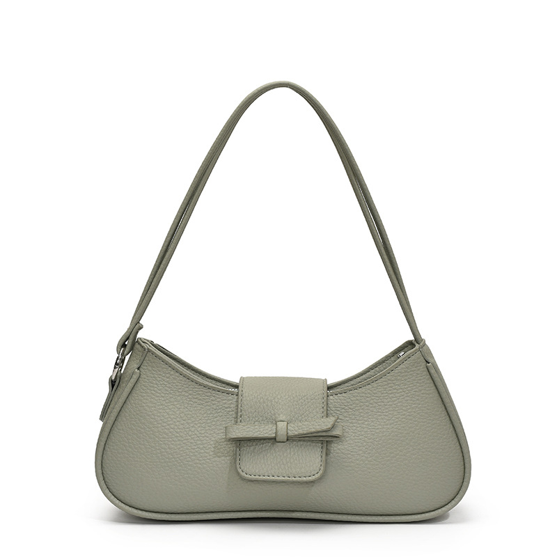 Versión coreana del bolso de axila de nicho 2025 primavera y verano nuevo bolso femenino lindo bolso de lazo bolso de hombro diario