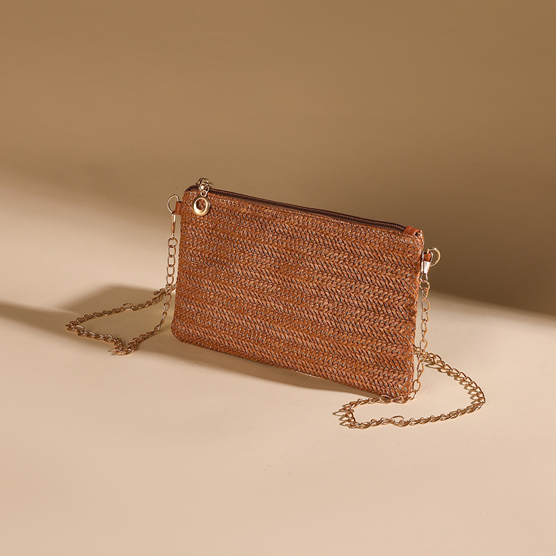 Spot primavera y verano nuevas señoras, cadena minimalista, pequeño bolso cuadrado, ocio, simple, elementos de paja, bolso de mensajero de un solo hombro para teléfono móvil