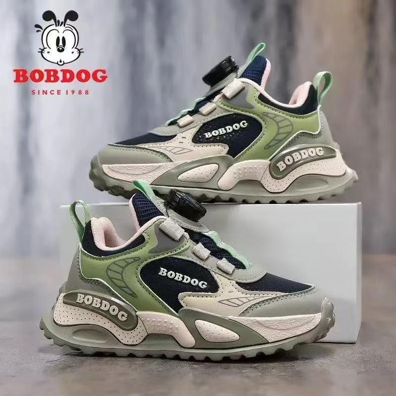 Babu Bean zapatos para niños primavera y otoño 2025 nuevo botón giratorio zapatos de niños de tamaño medio y grande malla transpirable zapatos deportivos para niños
