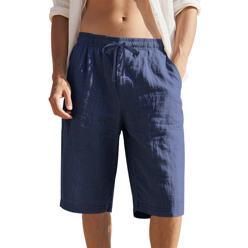 Estación independiente de lino transfronterizo cuerda elástica cintura recta piernas TK color sólido transpirable playa diaria siete puntos pantalones cortos casuales para hombres
