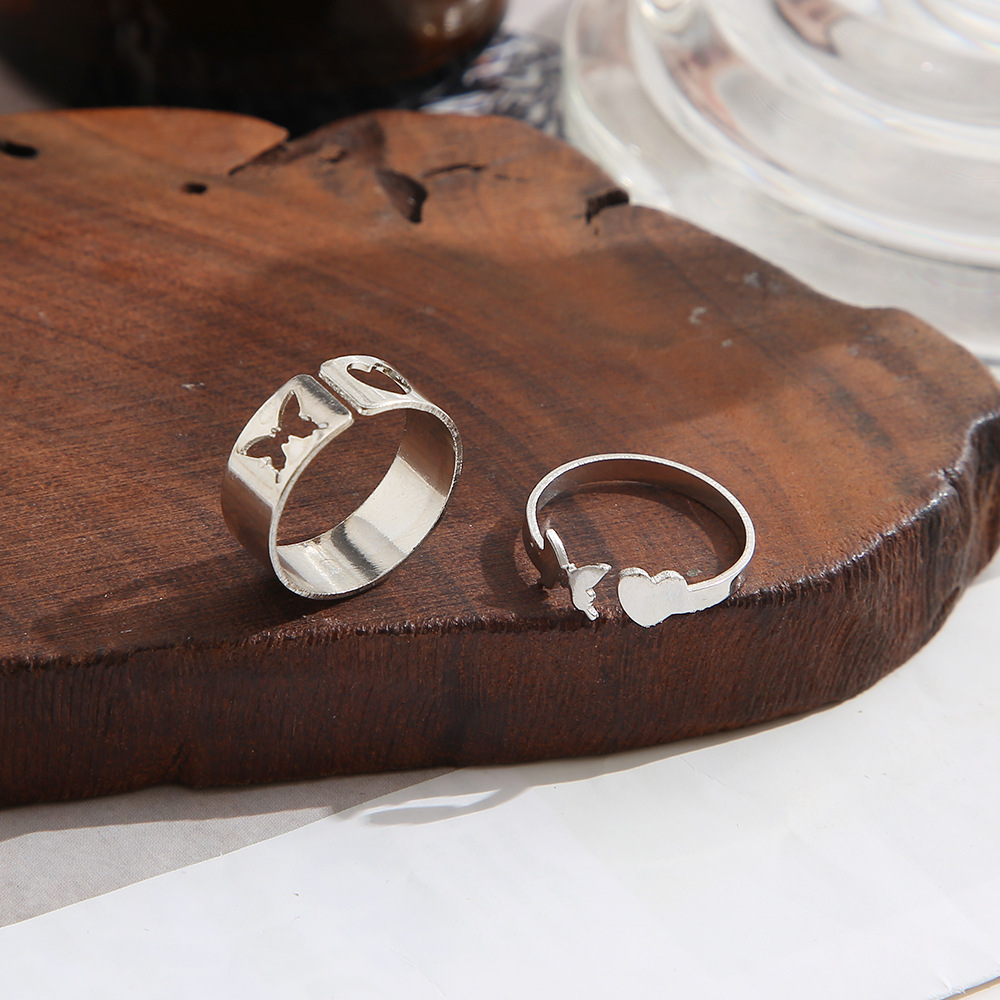 fashion geometric hollowed heart butterfly shaped alloy rings two piece set wholesale