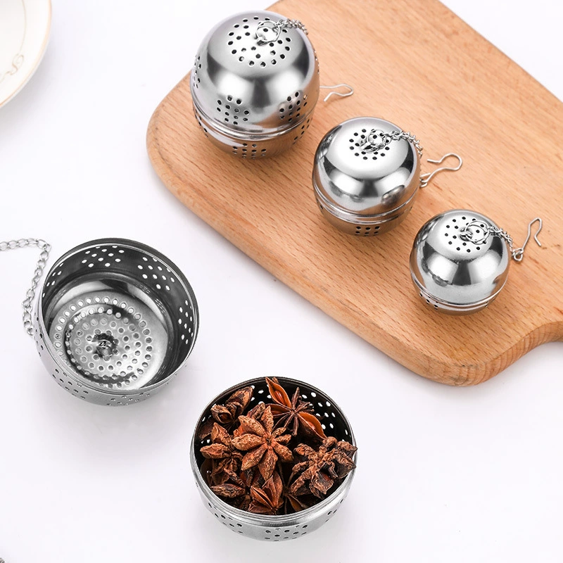 A piece of stainless steel tea ball makeup tea 味 宝 一 一 一 一 料 ingredients kitchen gadget chimin