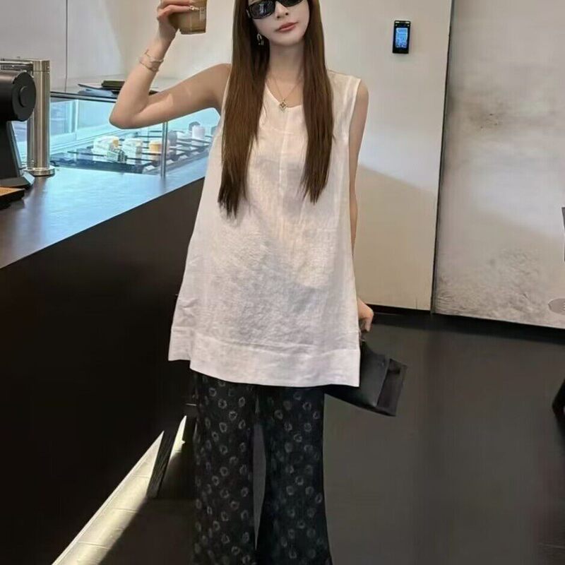 Korean-Style Loose Sleeveless Shirt + Flared Pants Two-Piece Set for Women, 2026 Summer New Style, Loose and Slimming Outfit Korean-Style Loose Sleeveless Shirt + Flared Pants Two-Piece Set for Women, 2026 Summer New Style, Loose and Slimming Outfit