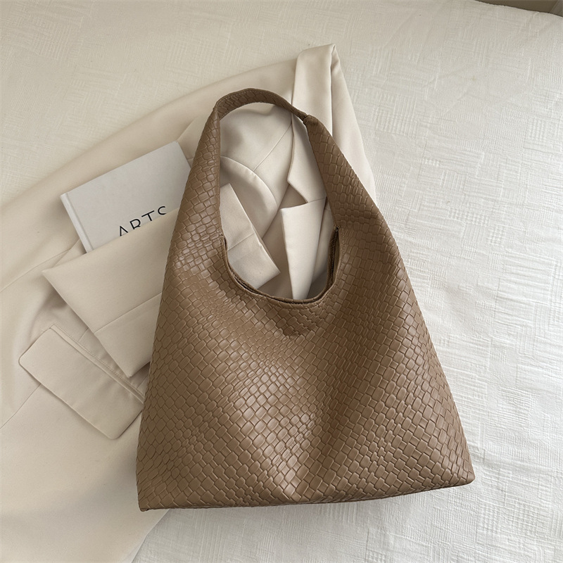 Otoño y invierno retro bolsos de dos piezas 2024, bolsos de moda de mujer, bolsos de hombro portátiles extranjeros, bolsos simples.