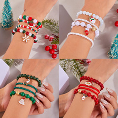 欧米のクリスマスのブレスレットのファッションカラーのアクリルはドリルの雪の鈴の弾力性の数珠のブレスレットのクリスマスのスーツを入れます。