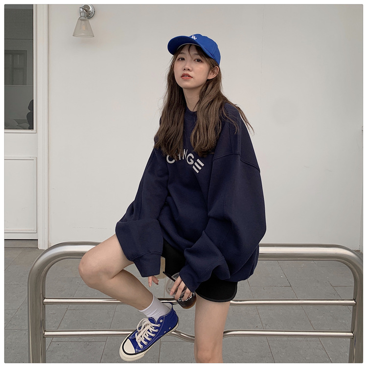 Woman in casual cap and jeans outfit