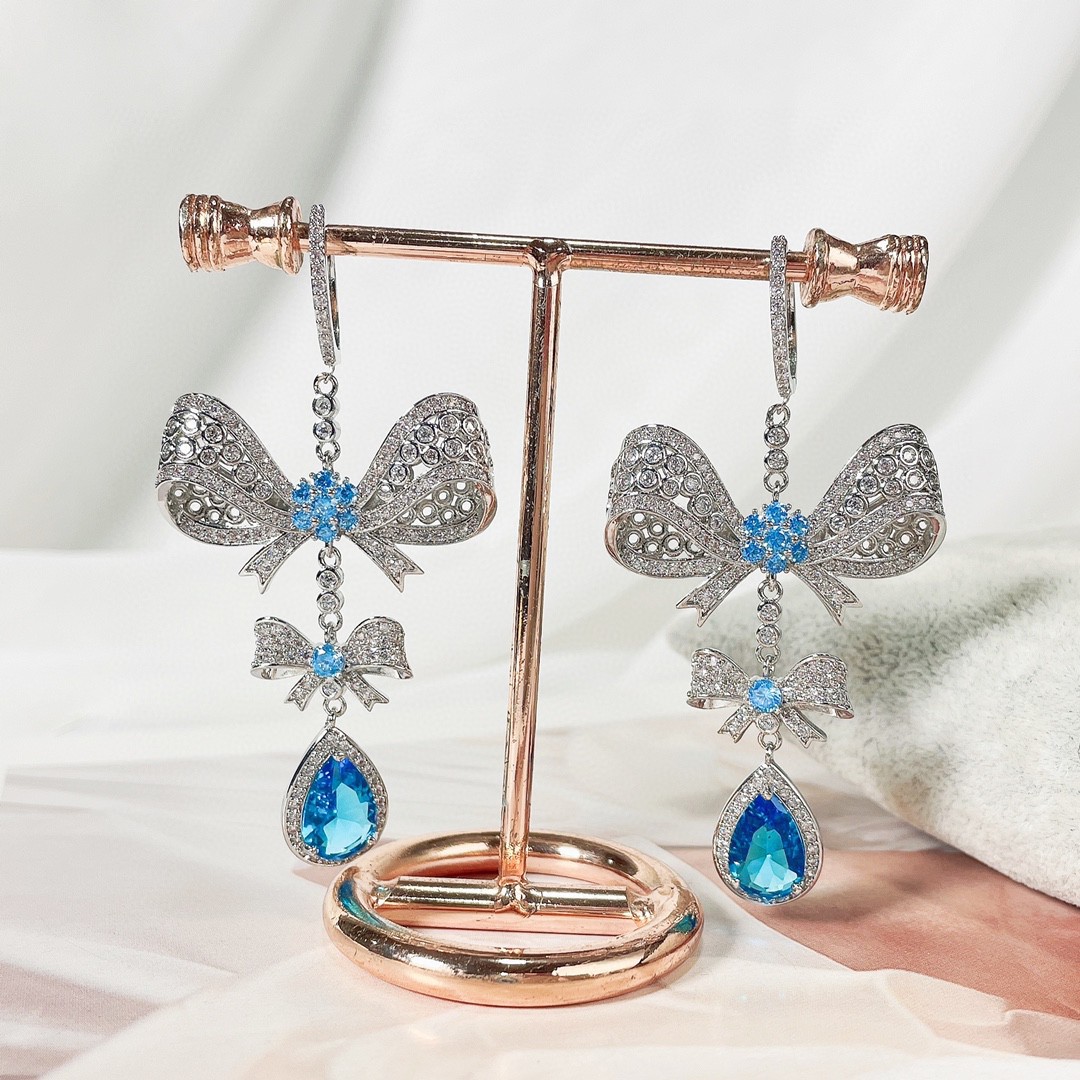 fashionable three dimensional long earrings with bow drop-shaped