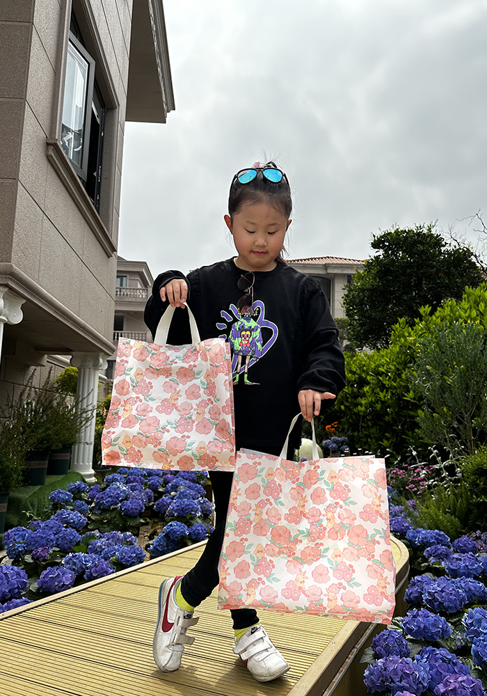 Bolsas de regalo de plástico personalizadas impresión logotipo bolsas de ropa personalizadas bolsas de goma de compras ropa de mujer portátil