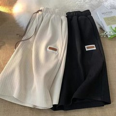半ズボンの男性の夏の薄いタイプの氷の糸のレジャーのバスケットボールの運動の5分の衛のズボンのアメリカのファッションのブランドのゆったりしている組み合わせのズボン