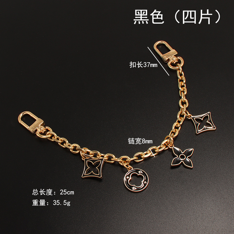 4 black hanging decorations 25cm chains