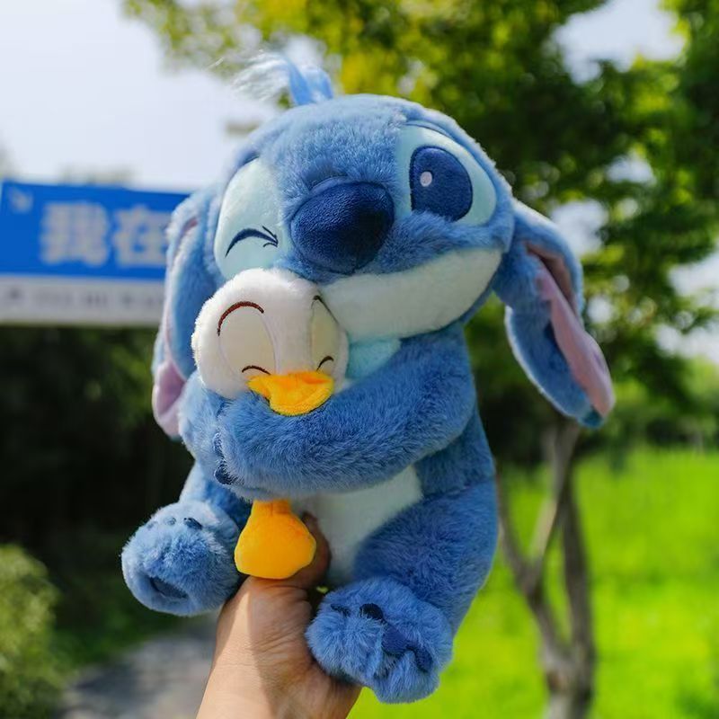国境を越えた圧縮可能なスティッチハグドナルドダックぬいぐるみ人形かわいいハグダックスティッチ人形|undefined