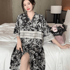 ネットの赤い高級感の氷の糸の黒い金の蝶の眠るスカートの女性の夏のタイプはゆったりしています。