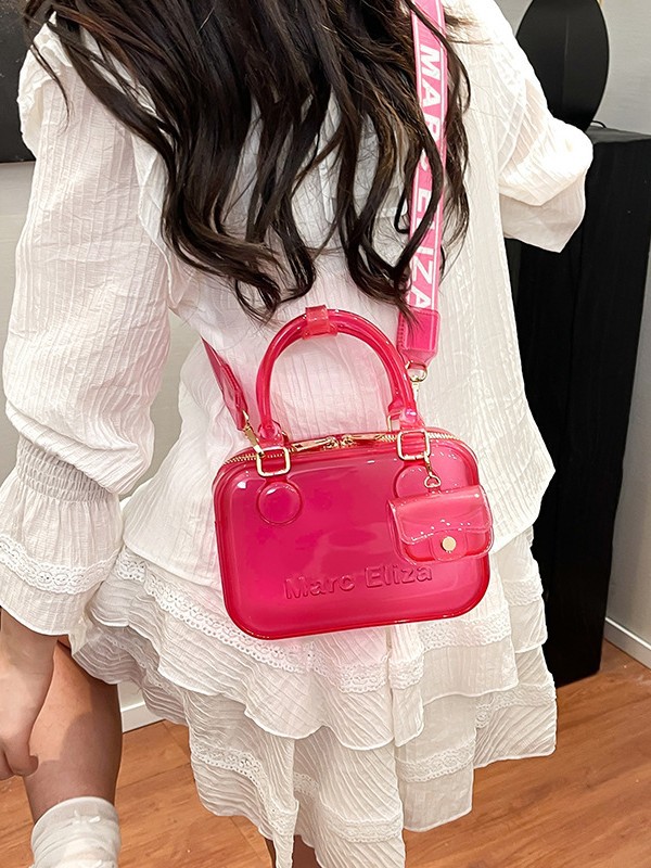 Estilo occidental transparente casual moda gelatina portátil pequeño bolso cuadrado femenino 2025 nuevo bolso bandolera de alta gama de todo fósforo