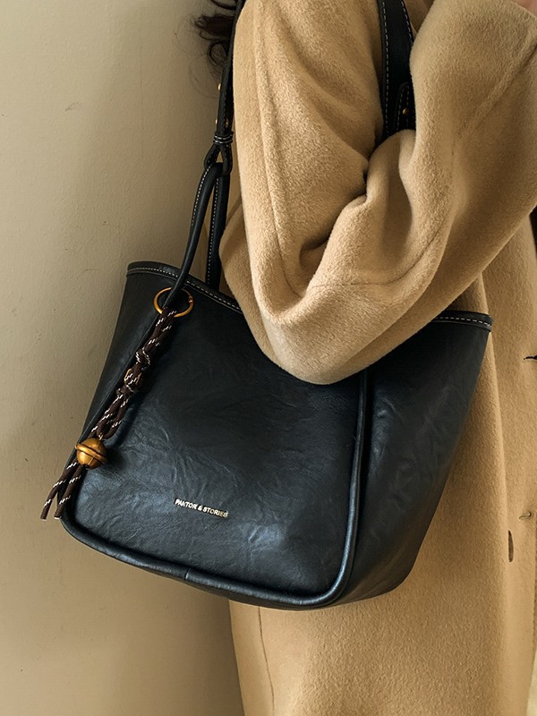 Bolso de mujer venta caliente nuevo nicho coreano bolso de cubo de alta capacidad de sensación universal bolso de moda para niños bolso de hombro